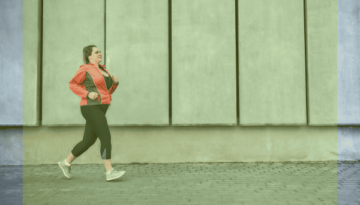 Leicht übergewichtige Frau beim Joggen – Abnehmen und Lauftraining